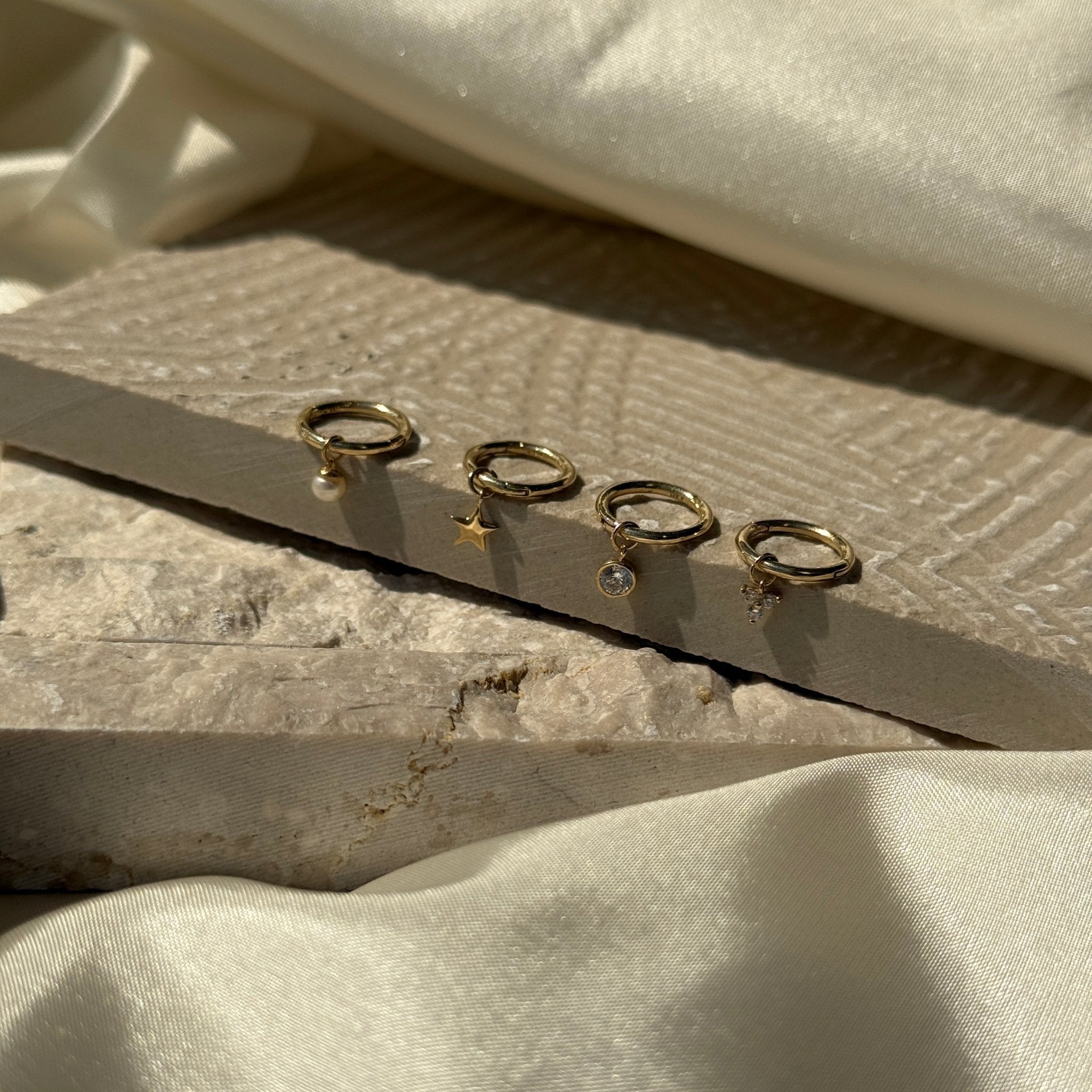 Hoop with Star Charm in Solid 14k Yellow Gold