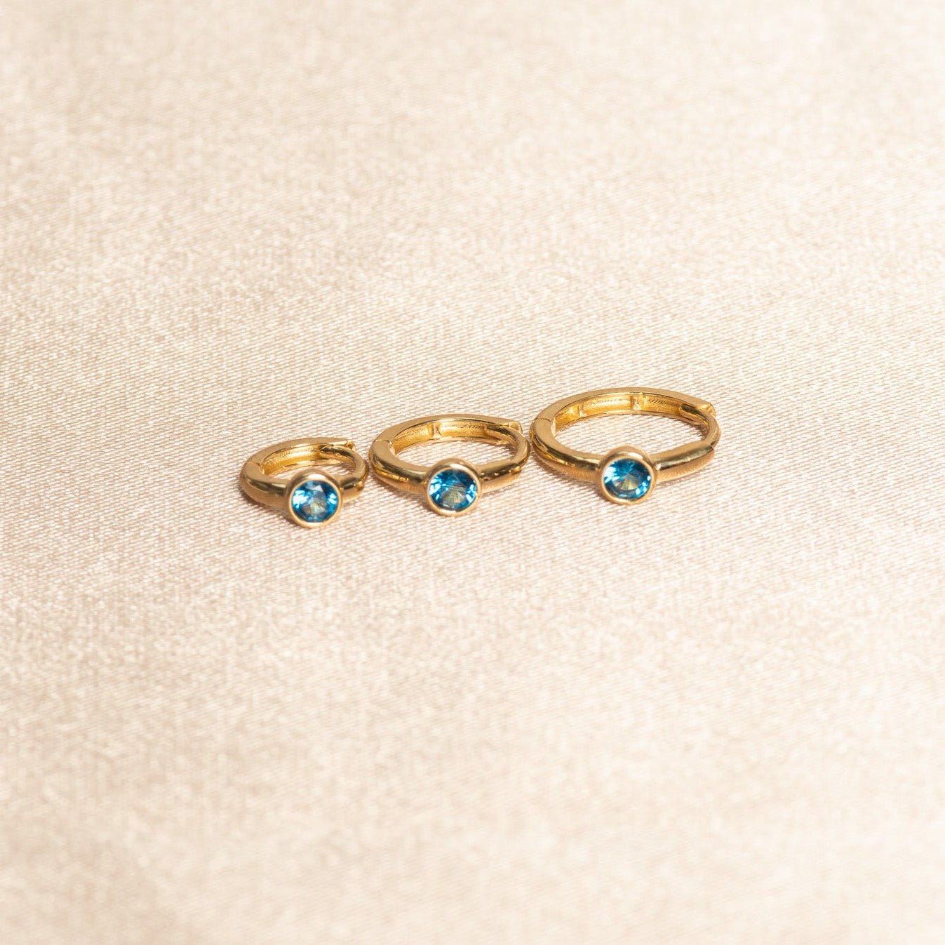 Bezel Set Blue Topaz Huggie in 14k Gold Earrings Estellacollection #product_description# 18368 blue Blue Gemstone cartilage hoop #tag4# #tag5# #tag6# #tag7# #tag8# #tag9# #tag10# 6mm Single Hoop