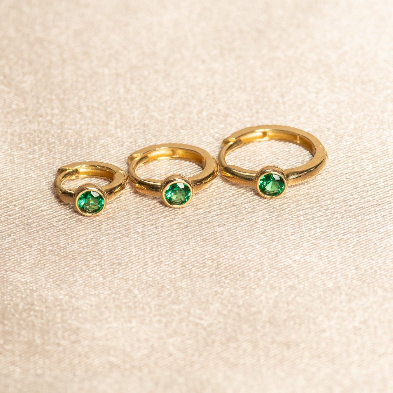 Bezel Set Emerald Huggie in 14k Gold Earrings Estellacollection #product_description# 18367 14k Birthstone Birthstone Earrings #tag4# #tag5# #tag6# #tag7# #tag8# #tag9# #tag10# 6mm Single Hoop