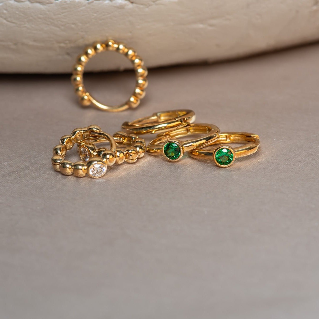 Bezel Set Emerald Huggie in 14k Gold Earrings Estellacollection #product_description# 18367 14k Birthstone Birthstone Earrings #tag4# #tag5# #tag6# #tag7# #tag8# #tag9# #tag10# 6mm Single Hoop