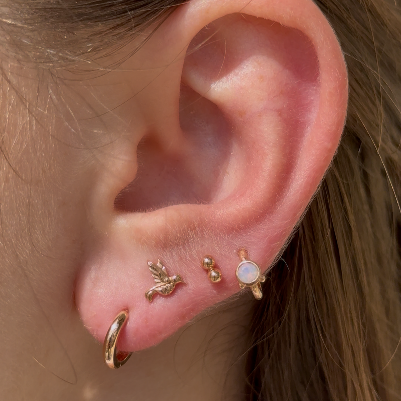 Bezel Set Opal Huggie in Solid 14k Yellow Gold