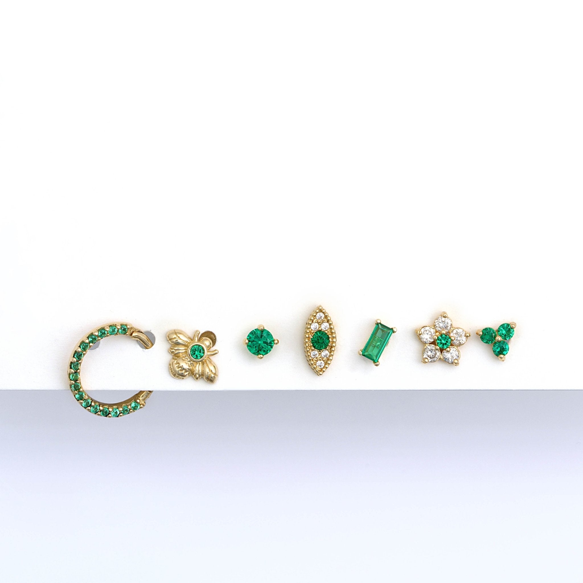 Emerald Studded Clicker Hoop in Solid 14k Yellow Gold